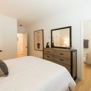 Furnished bedroom and bathroom in The Concord apartments